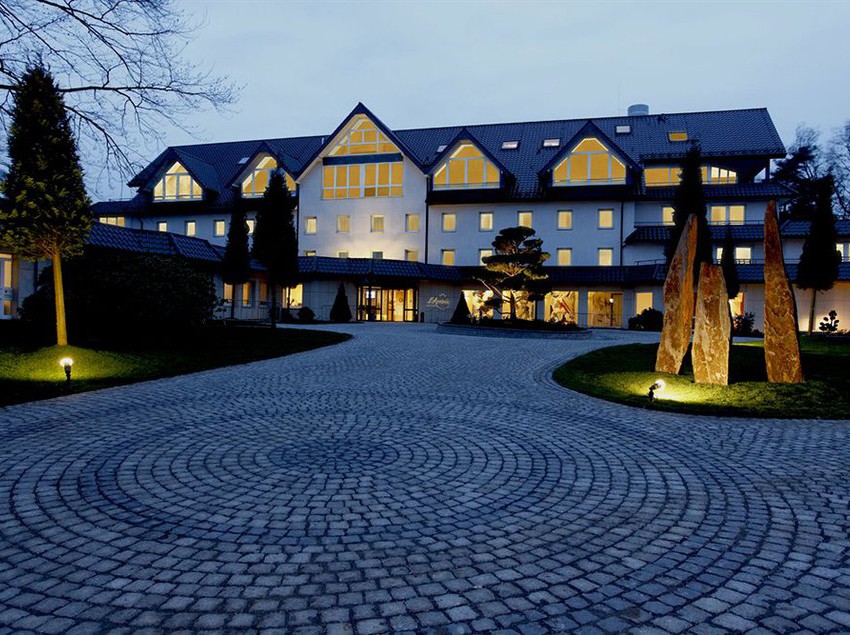 Historic white facade of the Fairmont Hotel Vier Jahreszeiten on Lake Alster, Hamburg