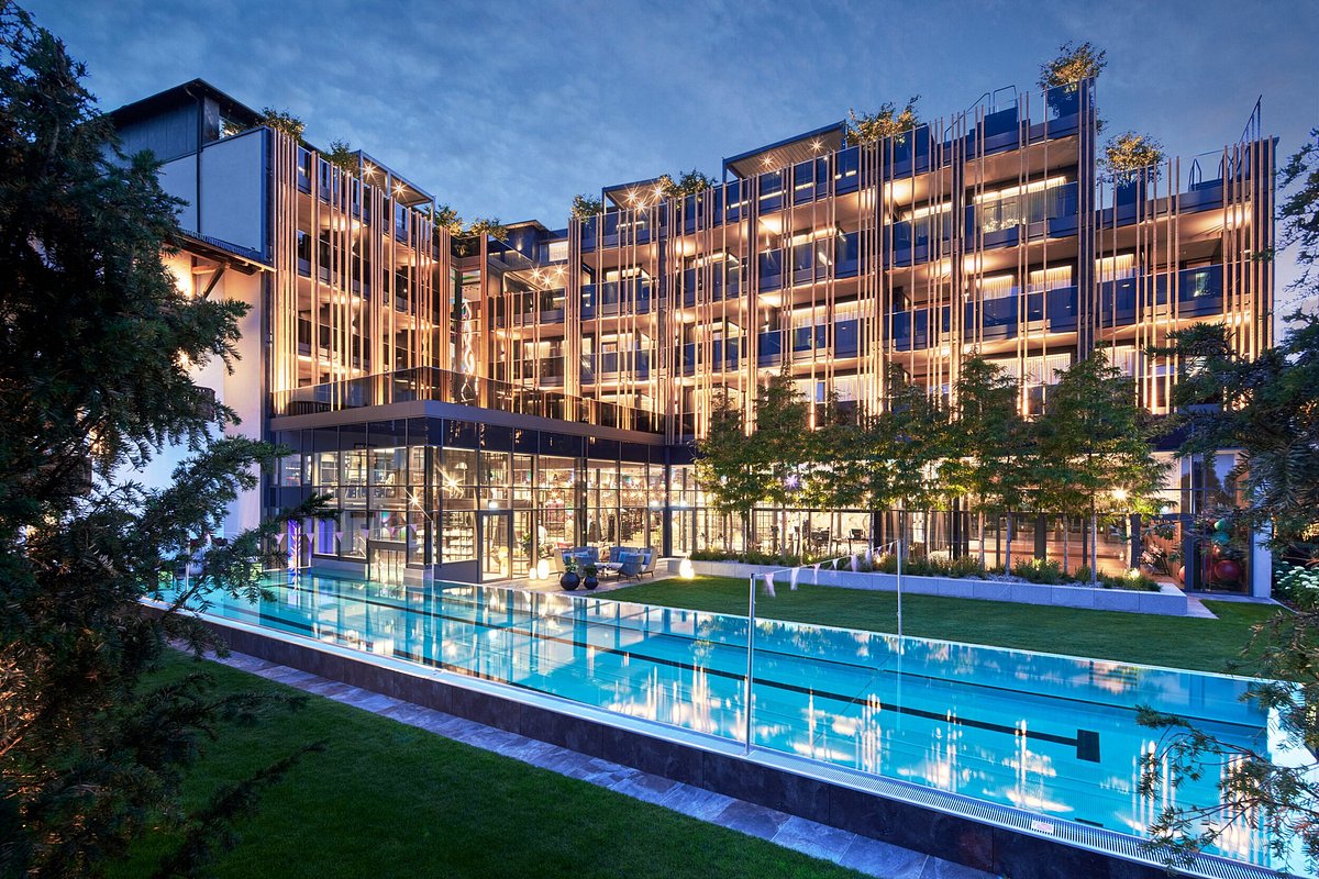 A sleek, modern hotel lobby with high-design furniture